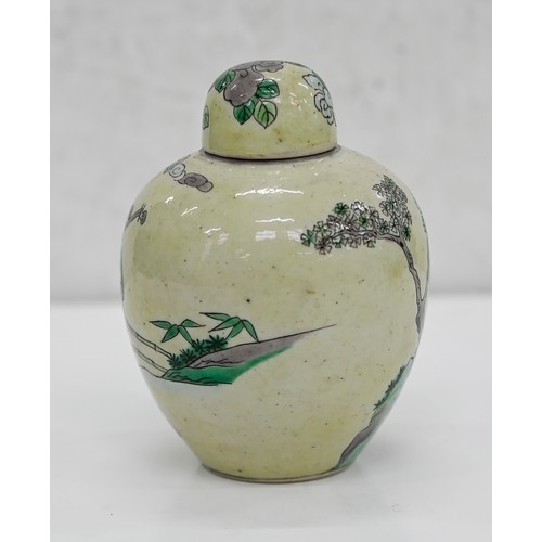 306 - A Chinese yellow ground jar and cover, 19th c, painted in black, green and aubergine with a sage, mu... 