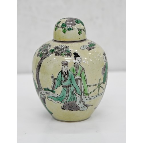 306 - A Chinese yellow ground jar and cover, 19th c, painted in black, green and aubergine with a sage, mu... 