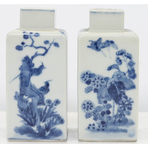 24 - A pair of Chinese blue and white tea caddies, 19th / 20th c, of square section, painted to all four ... 