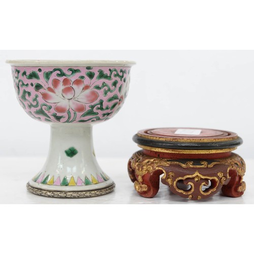 273 - A Chinese famille rose stem cup, the bowl enamelled with dragon roundels and peonies on a pink groun... 