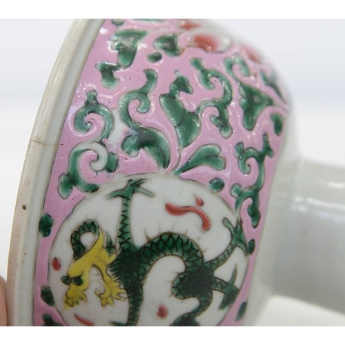 273 - A Chinese famille rose stem cup, the bowl enamelled with dragon roundels and peonies on a pink groun... 