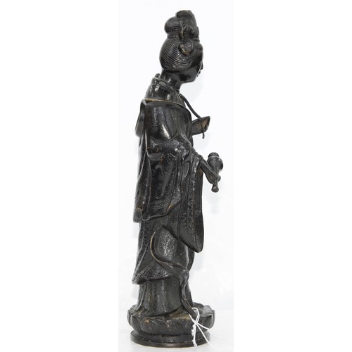 325 - A Chinese bronze figure of Guanyin, 19th c, a lotus and flask in her hands, on lotus base, 32cm h... 