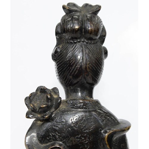 325 - A Chinese bronze figure of Guanyin, 19th c, a lotus and flask in her hands, on lotus base, 32cm h... 