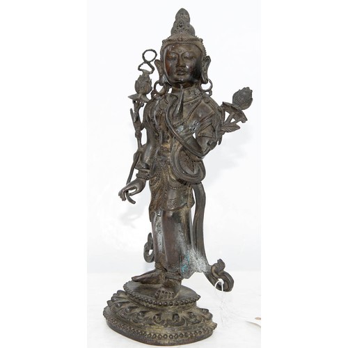 327 - A Tibetan bronze figure of Guanyin, 19th c, on lotus base, sealed, 26.5cm h