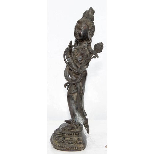 327 - A Tibetan bronze figure of Guanyin, 19th c, on lotus base, sealed, 26.5cm h