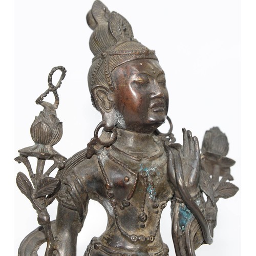 327 - A Tibetan bronze figure of Guanyin, 19th c, on lotus base, sealed, 26.5cm h