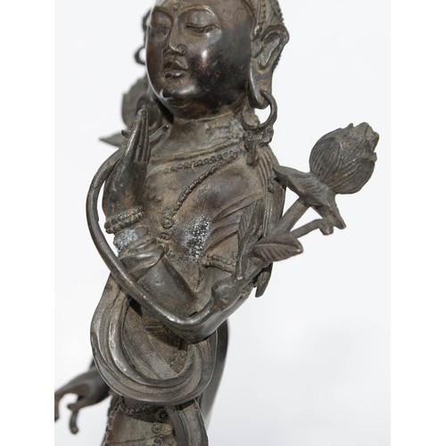 327 - A Tibetan bronze figure of Guanyin, 19th c, on lotus base, sealed, 26.5cm h