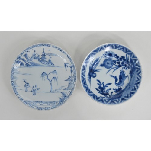 115 - A Chinese blue and white tea bowl and pair of saucers, Kangxi period, saucers 12.7cm diam, conch she... 