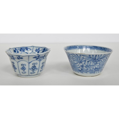 115 - A Chinese blue and white tea bowl and pair of saucers, Kangxi period, saucers 12.7cm diam, conch she... 