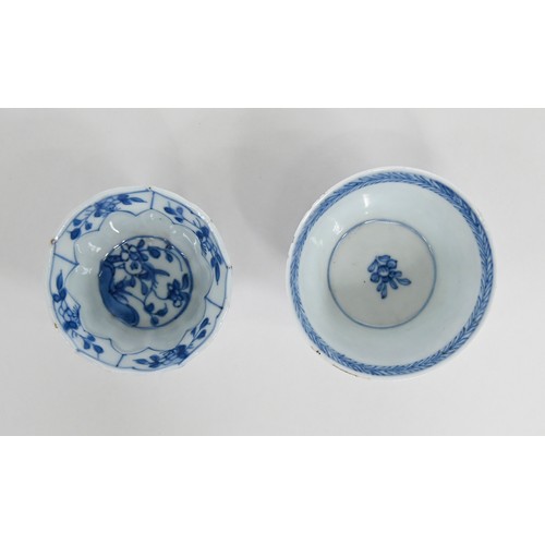 115 - A Chinese blue and white tea bowl and pair of saucers, Kangxi period, saucers 12.7cm diam, conch she... 