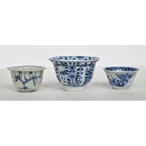 115 - A Chinese blue and white tea bowl and pair of saucers, Kangxi period, saucers 12.7cm diam, conch she... 