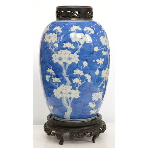 161 - A Chinese blue and white jar, late 19th / early 20th c, painted with prunus on a cracked ice ground,... 