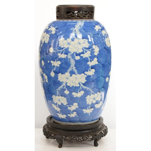 161 - A Chinese blue and white jar, late 19th / early 20th c, painted with prunus on a cracked ice ground,... 