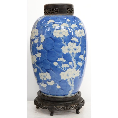 161 - A Chinese blue and white jar, late 19th / early 20th c, painted with prunus on a cracked ice ground,... 