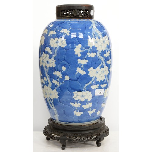 161 - A Chinese blue and white jar, late 19th / early 20th c, painted with prunus on a cracked ice ground,... 