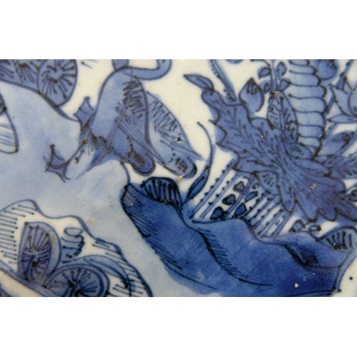 260 - A Chinese Kraak porcelain blue and white dish, c1630-1650, painted to the centre with two geese at t... 