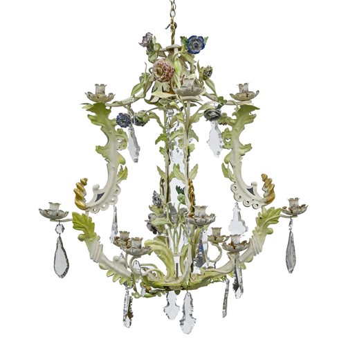 1154 - A naturalistic painted metal chandelier, late 20th c, of eight lights, issuing from leafy branches a... 