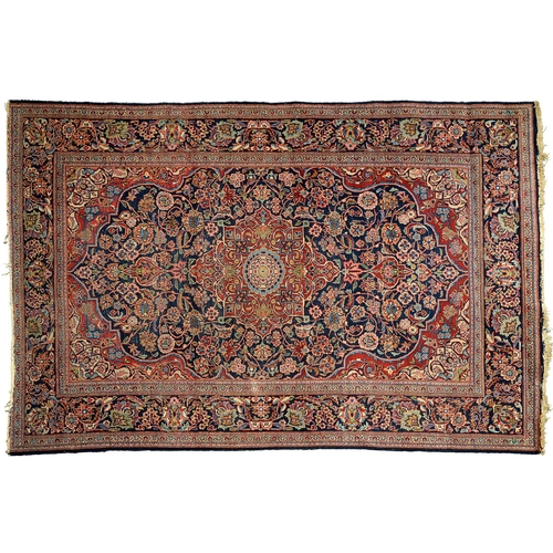 1168 - A Kashan rug, second quarter 20th c, 133 x 205cm