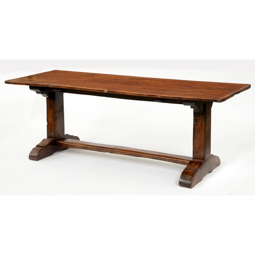 1218 - An oak table, the boarded top with cleated ends, on rectangular end supports  with sledge base and m... 