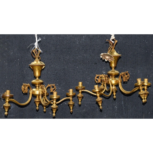 1142 - A pair of lacquered brass five light chandeliers, 20th c,  44cm h