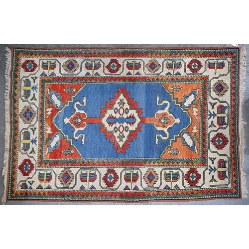 1165 - A blue ground rug, 148 x 226cm