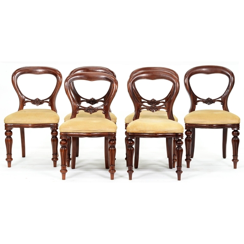 1181 - A Victorian mahogany dining table and a set of six Victorian mahogany balloon back dining chairs, ta... 