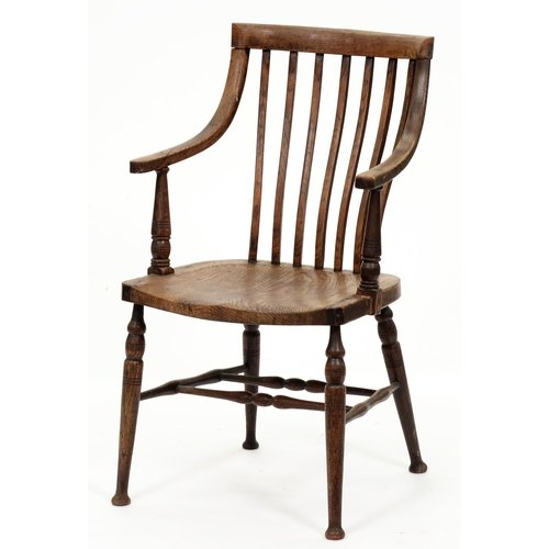 1184 - A beech and elm armchair, early 20th c