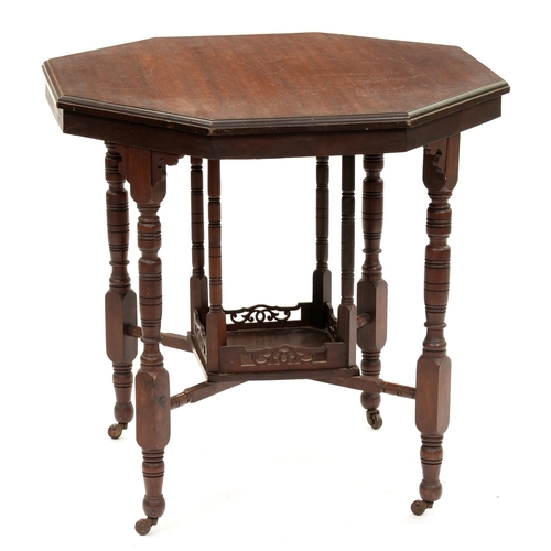 1185 - An octagonal mahogany table,  71cm h; 74 x 74cm