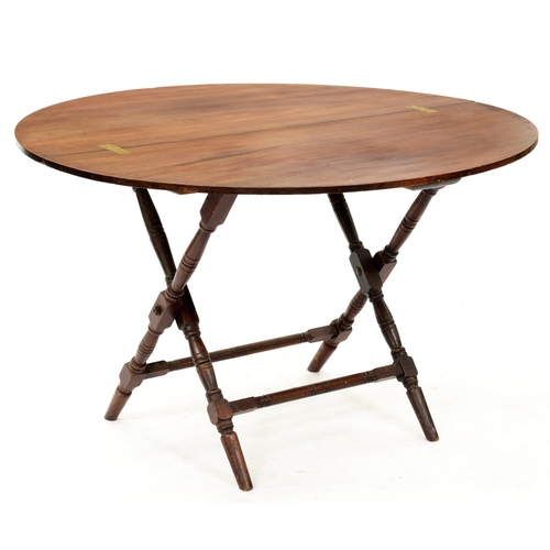 1202 - A mahogany folding table, Thornton & Heath 13 Little Goodman Place Pont Street SW, c1920, on tur... 