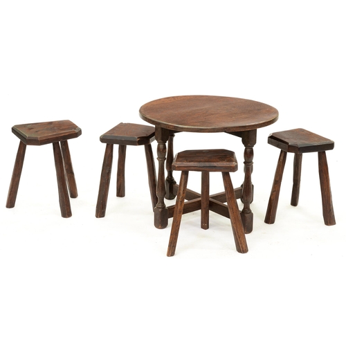 1209 - A dark stained oak round table and four three legged stools, first half 20th c,  table 48cm h, 59cm ... 