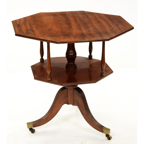 1244 - A George III octagonal mahogany two-tier tripod table, with revolving top, on reeded legs with brass... 