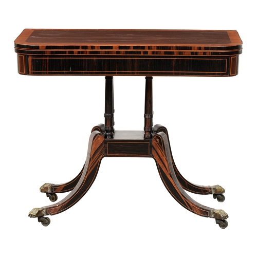 1248 - A George IV zebrawood card table,  crossbanded in satinwood, on ring turned pillars, block and four ... 
