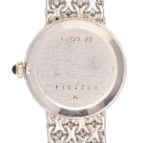 175 - A Jaeger LeCoultre 18ct white gold lady's wristwatch, 24mm diam, on 18ct white gold bracelet and mak... 