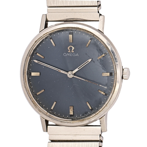 215 - An Omega stainless steel gentleman's wristwatch, with blue dial, 34mm diam, and associated expanding... 