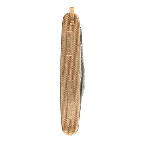 243 - A 9ct gold folding knife, the scales engine turned, 78mm l, maker WM Ltd, Birmingham 1972... 