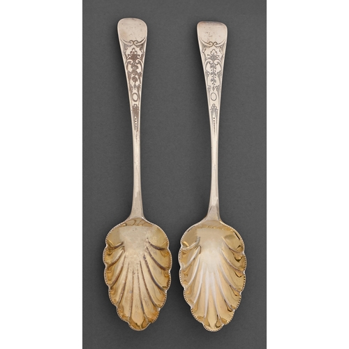 258 - A pair of George III silver tablespoons, Old English pattern, later chased and bowls gilt, by Solomo... 