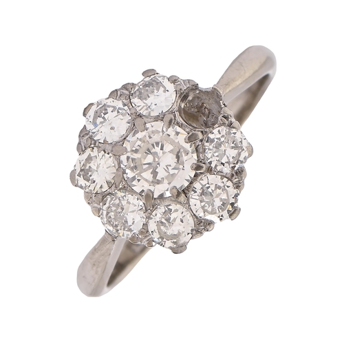 28 - A diamond ring, with a cluster of eight round brilliant cut diamonds (originally nine), in white gol... 