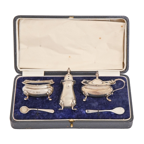 284 - A George V silver condiment set, blue glass liners, pepperette 80mm h, by Adie Brothers Ltd, Birming... 