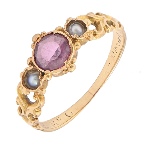 3 - A Victorian amethyst and split pearl ring, in gold, with pierced and chased shoulders and fluted hoo... 