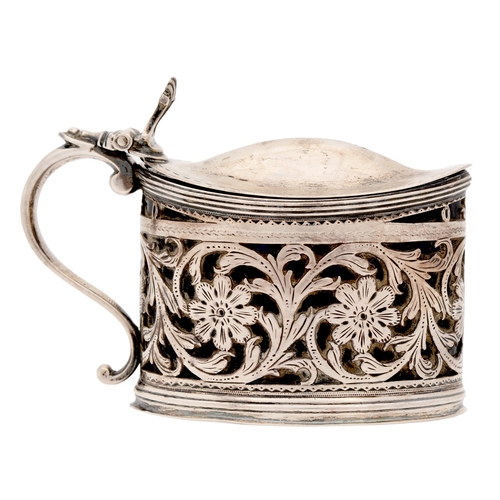 301 - A George III silver mustard pot, pierced and engraved with scrolling foliage, 75mm h, by Michael Plu... 