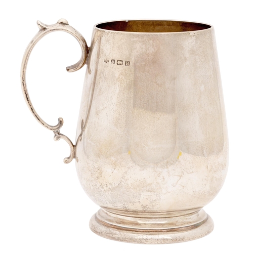 305 - A George V silver mug, quite plain with C-shaped handle, 13cm h, by A E Poston & Co Ltd, Birming... 