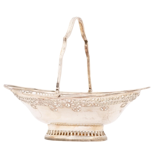 308 - An Edwardian pierced silver basket, engraved with festoons, swing handle, 18.5cm l, by C S Harris &a... 