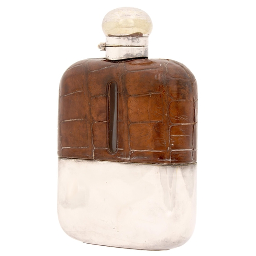 312 - A Victorian EPNS mounted glass hip flask, with crocodile hide covered shoulder, 18cm h... 