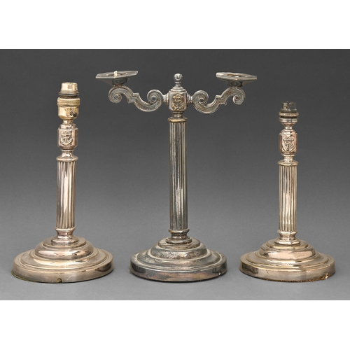 329 - Royal Navy. A pair of EPNS wardroom candlestick form electric table lamps, and a candelabrum, mid 20... 