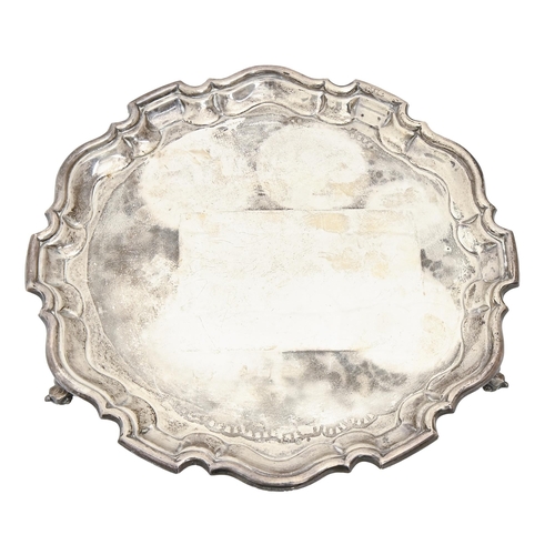 338 - An Elizabeth II silver salver, on three volute feet, 30.5cm diam, by Viners Ltd, Sheffield 1958, 26o... 