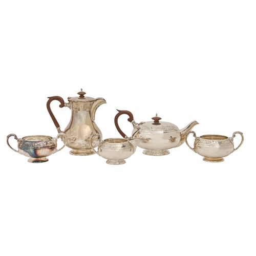 340 - A George VI four-piece silver tea service and an Elizabeth II additional silver sugar bowl, with flo... 