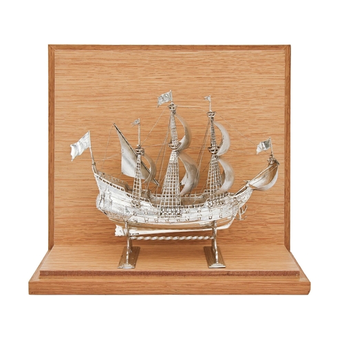 341 - A German silver nef in the form of a carrack of three masts, with billowing silver sails and wire ri... 