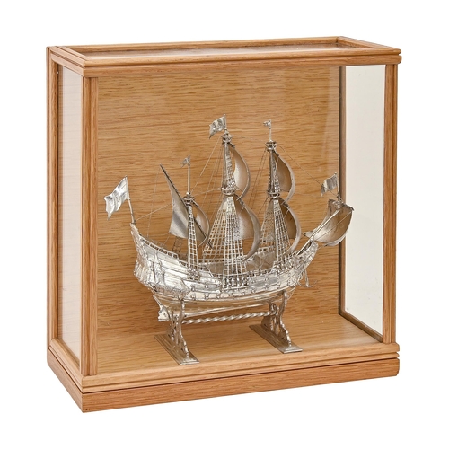 341 - A German silver nef in the form of a carrack of three masts, with billowing silver sails and wire ri... 