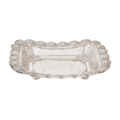 351 - A Victorian silver sweetmeat dish, with pierced cavetto and paterae to the textured border, on bun f... 