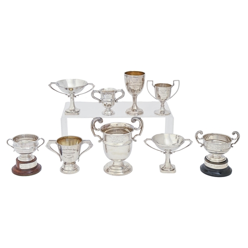 354 - Eight silver trophy cups and a goblet, George V - George VI, 16.5cm h and smaller, Birmingham and Sh... 